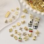 100PCS Gold Nail Charms: Bow, Cherry, Butterfly, Cross, Heart, Star, Flower Designs - Image 3