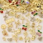 100PCS Gold Nail Charms: Bow, Cherry, Butterfly, Cross, Heart, Star, Flower Designs - Image 2